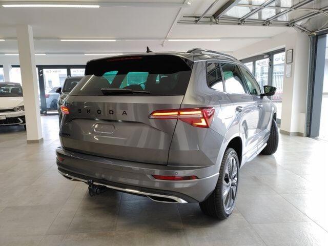 Skoda Karoq 1.5 TSI DSG SPORTLINE TREKHAAK/CAMERA/CARPLAY/ACC/STOELVERW/E-KLEP