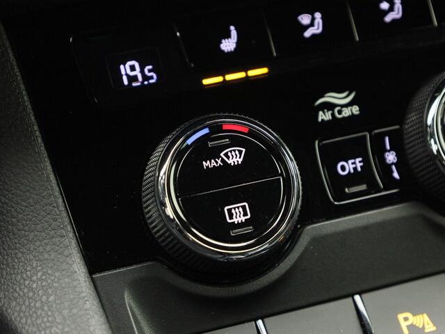 Skoda Karoq 1.5TSI/150PK ACT Sportline DSG · Navigatie · Camera + Parkeersensoren · Stoel-& stuurverwarming · Garantie tot februari 2027 of 60000km.