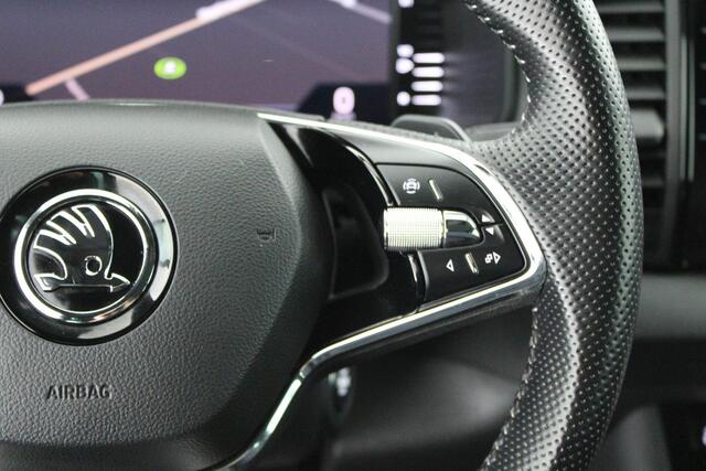 Skoda Karoq 1.5 TSI 150pk DSG Sportline Business Panoramadak Stoelverwarming Navigatie Canton Audio Camera Keyless Virtual Cockpit