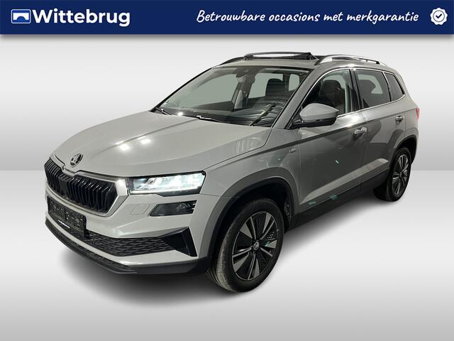 Skoda Karoq 1.0 TSI Ambition / PANO/ STUUR+STOEL VERWARMING/ PARK.SENSOREN V+A/ CAMERA/ ACC/ SMARTLINK/ NAVI/ DIGITAL DASH/ DAB/ CLIMA/ LED/ ISOFIX/ 17'' LMV