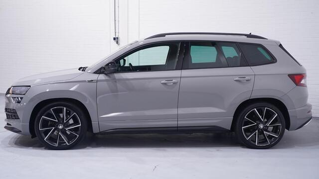 Skoda Karoq 1.5 TSI ACT Sportline Business Panoramadak Apple Carplay Camera NAP Stoel- en voorruitverwarming Canton Soundsysteem Virtual Cockpit Trekhaak