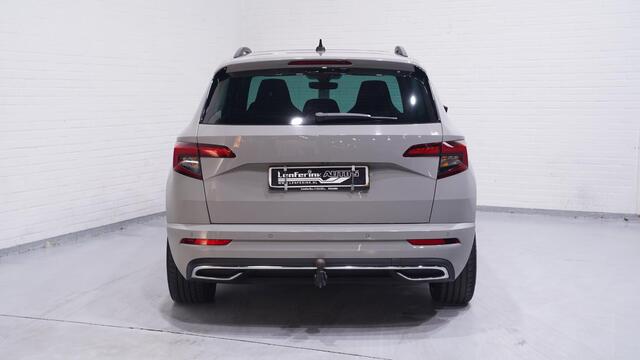 Skoda Karoq 1.5 TSI ACT Sportline Business Panoramadak Apple Carplay Camera NAP Stoel- en voorruitverwarming Canton Soundsysteem Virtual Cockpit Trekhaak