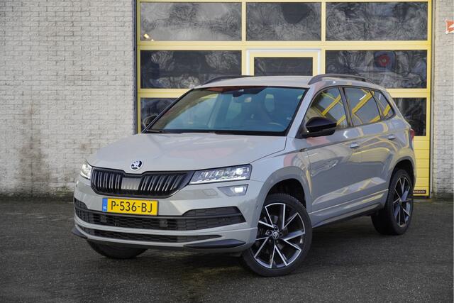 Skoda Karoq 1.5 TSI ACT 150PK! Automaat Sportline Business BJ2022 Lmv 19" | Led V+A | Pdc | Navi | Keyless entry | Elek. trekhaak | Verwarmd voorruit | Achteruitrijcamera | App-Connect | Virtual cockpit | Canton Audio | Verwarmde voorstoelen/stuurwiel | Zwarte hemel