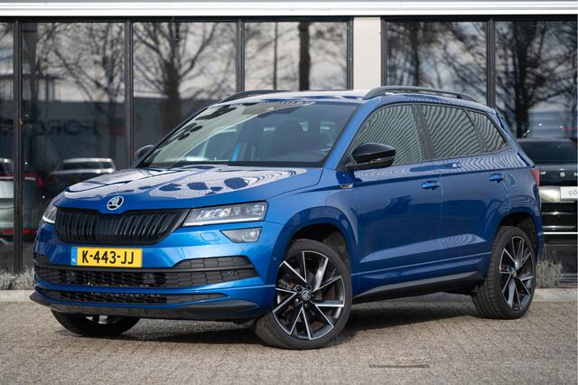 Skoda Karoq 1.5 TSI ACT Sportline Business | Trekhaak | Adapt. Cruise | CANTON | Camera | 19" | Winterpakket