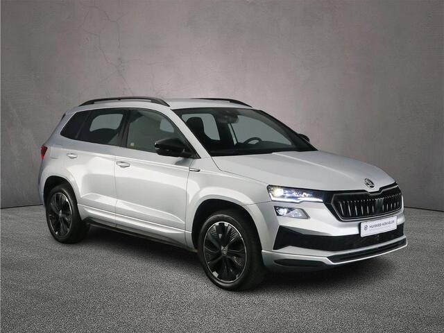 Skoda Karoq Sportline Business 1.5 TSI 150pk DSG Automaat Trekhaak, Adaptive cruise control, Achteruitrijcamera, Navigatie, Elektrische achterklep, LED matrix koplampen