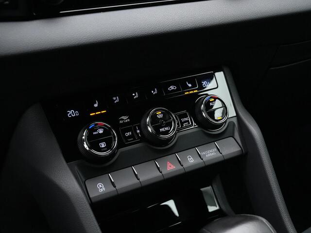 Skoda Karoq 1.5 TSI ACT 150 pk DSG Sportline | Adaptief onderstel | Stuur-/achterbankverwarming | Matrix LED | Keyless