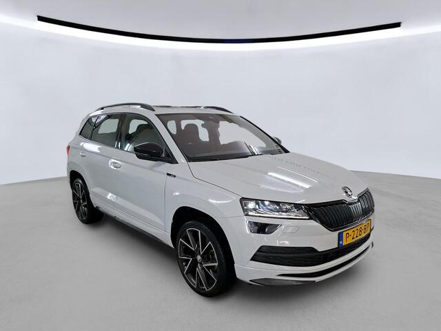 Skoda Karoq 1.5 TSI ACT Sportline Business Panorama Camera Stoel/Stuurverwarming Canton Sound Ozon en 1x velg miss Kofferklep schuren