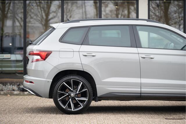Skoda Karoq 1.5 TSI ACT Sportline Business | Trekhaak | Adapt. Cruise | Camera | 19" | Winterpakket