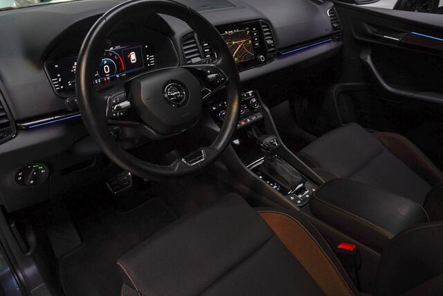 Skoda Karoq 1.5 TSI ACT Panodak Navi Virtual Stoelverwarming Cruise PDC LM velgen