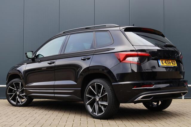 Skoda Karoq 1.5 TSI ACT Sportline Business Automaat | Virtual Cockpit | Trekhaak | Panoramadak | Adaptieve Cruise | Stoelverwarming | Camera | Canton