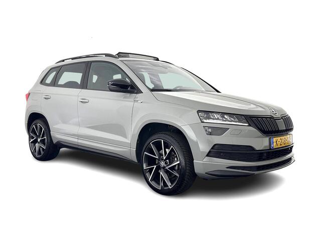 Skoda Karoq 1.5 TSI ACT Sportline Business (INCL.BTW) Aut. *PANO | DIGI-COCKPIT | FULL-LED | ADAPTIVE-CRUISE | CANTON-SOUND | BLIND-SPOT | HEATED-SPORTSEATS | CAMERA | AMBIENT-LIGHT | NAVI-FULLMAP | KEYLESS | DAB+ | TOWBAR | 19''ALU*