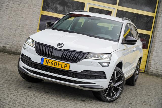 Skoda Karoq 1.5 TSI ACT 150PK! Automaat Sportline Business BJ2021 Lmv 19" | Led V+A | Pdc | Navi | Keyless entry | Elek. achterklep | Achteruitrijcamera | App-Connect | Virtual cockpit | Canton audio | | Sportstoelen | Verwarmde voorstoelen/stuurwiel | Zwarte hemel