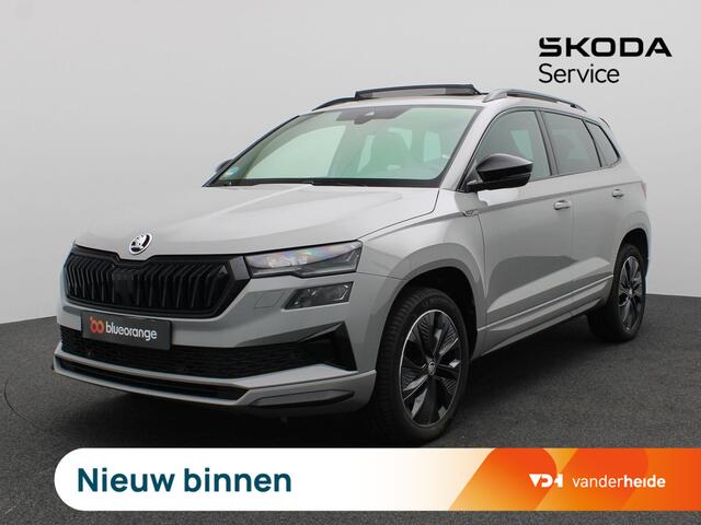 Skoda Karoq 1.5 TSI ACT Sportline Business 150PK Facelift, Pano-Schuifdak, Trekhaak, 18" LM Velgen, Adaptieve Cruise Control, Matrix LED-Verlichting, Achteruitrijcamera, Virtual Pedal, Voorruitverwarming, Keyless