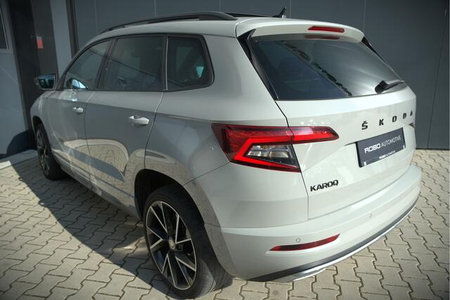 Skoda Karoq 1.5 TSI ACT Sportline Business | Panoramadak | Stoelverwarming | Stuurverwarming | Canton | Keyless | Apple Carplay | Camera | Adaptive Cruise Control | Dodehoekdetectie
