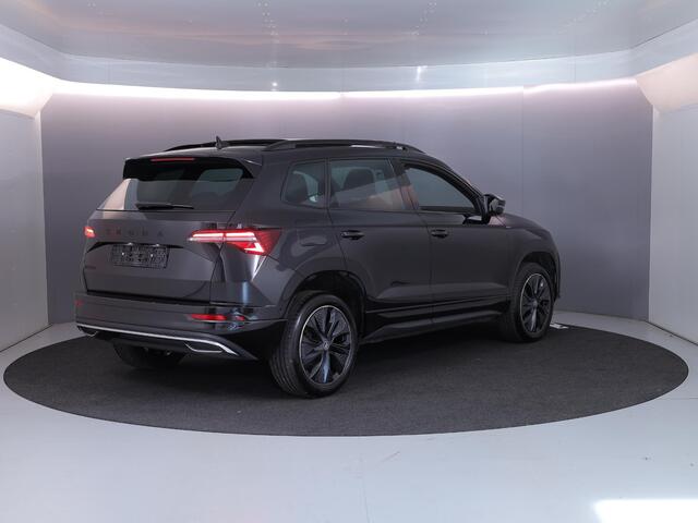 Skoda Karoq 1.5 TSI ACT Sportline Business 150 pk Automaat (DSG) | Verlengde garantie | Navigatie | Panoramadak | Parkeersensoren (Park assist) | Rondomzicht camera | Stoelverwarming v/a |