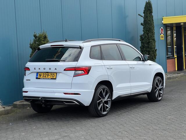 Skoda Karoq 1.5 TSI DSG AUT. Sportline Business PANO | CANTON.AUDIO | CARPLAY | TREKH.ELEK | STUUR/STOELVERW | DIGI.DASHB | ADAPT.CRUISE | CAM | LED | NAV | PDC | LMV