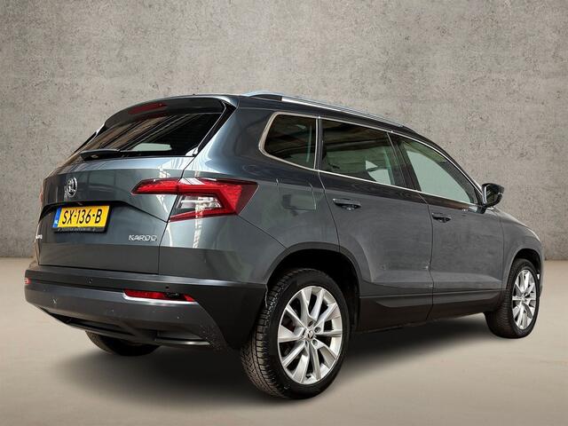 Skoda Karoq 1.0 TSI Sport Automaat (PANORAMADAK, APPLE CARPLAY, GROOT NAVI, CLIMATE, CAMERA, STOELVERWARMING, SPORTSTOELEN, GETINT GLAS, ADAPTIVE CRUISE, NIEUWE APK, NIEUWSTAAT)