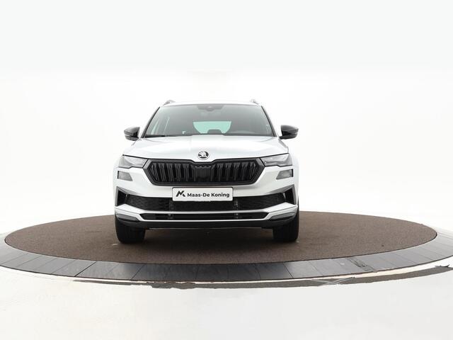 Skoda Karoq 1.5TSI/150PK DSG ACT Sportline · Camera · Elek. Trekhaak · Elek. Achterklep · Apple/Android Car Play · Navigatie · 18'' Inch · Garantie t/m 27-02-2029 of 60.000km