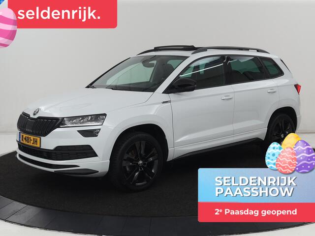 Skoda Karoq 1.5 TSI Sportline | Panoramadak | Stoelverwarming | Adaptive cruise | Camera | Sportstoelen | Virtual Cockpit | Navigatie | Sfeerverlichting | Full LED | 18'' | Keyless | Climate control