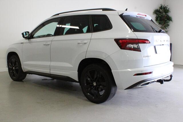 Skoda Karoq 1.5 TSI ACT Sportline Business | CANTON | TREKHAAK | ACC | BLINDSPOT | CAMERA | STOEL-VERW | NAVI | LMV |