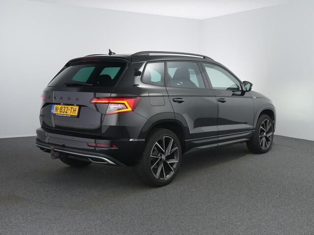 Skoda Karoq 1.5 TSI ACT Sportline Business | Zwenkhaak | Winterpakket | Canton | ACC | Dodehoeksensor |
