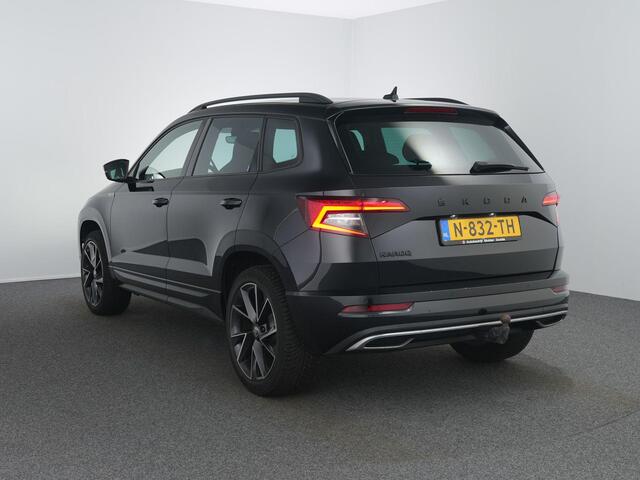 Skoda Karoq 1.5 TSI ACT Sportline Business | Zwenkhaak | Winterpakket | Canton | ACC | Dodehoeksensor |
