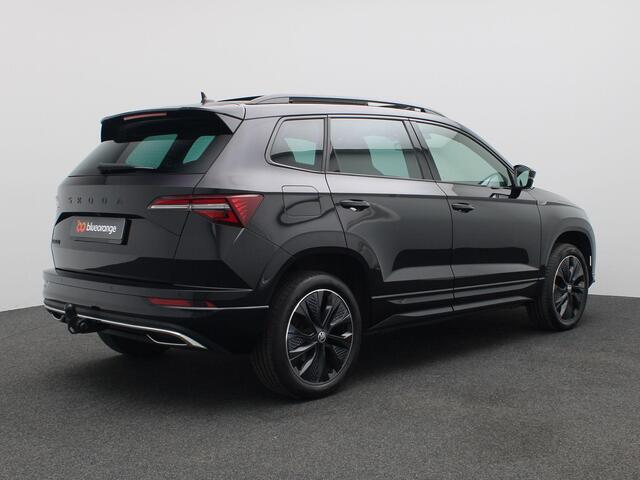 Skoda Karoq 1.5 TSI ACT Sportline Business 150PK DSG Panoramadak, Trekhaak, Achteruitrijcamera, Winterpakket Plus, Keyless, Virtual pedal, 18'' lichtmetaal, Side Assist