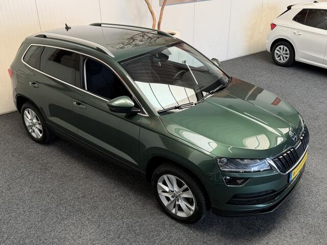 Skoda Karoq 1.5 TSI ACT STYLE NAVIGATIE CRUISE COMNTROL ELEK. VERST. BESTUURDERSSTOEL MET GEHEUGEN STOEL EN VOORRUIT VERWARMING APPLE CARPLAY/ANDROID ACHTERUITRIJCAMERA ZEER MOOI !!