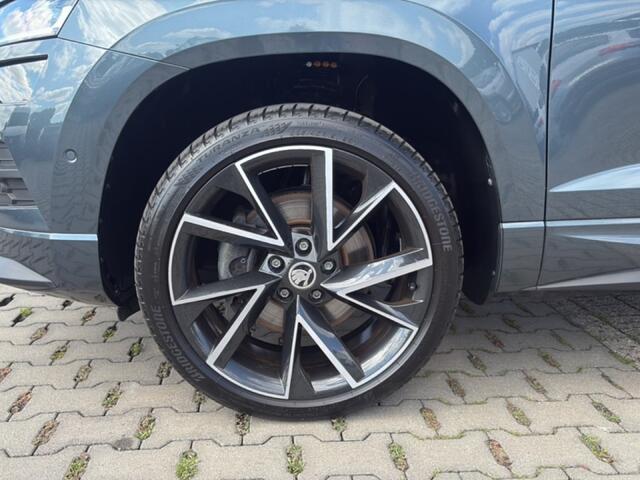 Skoda Karoq 1.5 TSI DSG SPORTLINE TREKHAAK/CAMERA/ELEK-KLEP/ACC/DIG-DASH/STOELVERW