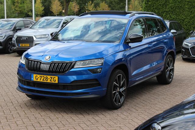 Skoda Karoq 2.0 TSI 4x4 Sportline Business / NL Auto! / Trekhaak / Panoramadak / Camera / CarPlay / Keyless / 19'' / DAB / Cruise Control