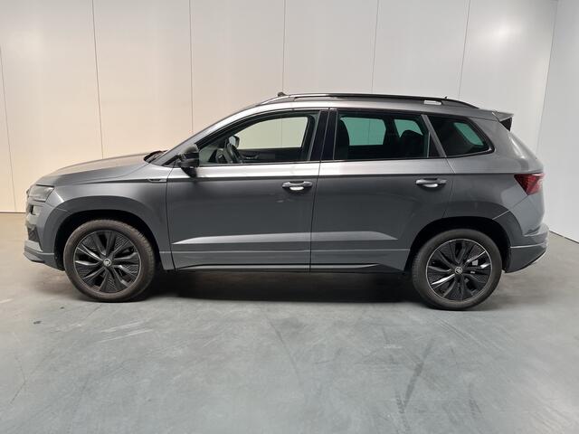Skoda Karoq 1.5 TSI ACT Sportline Business / AUTOMAAT/ PANODAK/ DIGITAL DASH/ KEYLESS/ SMARTLINK/ PARK. SENSOREN/ STOELVERWARMING V&A/ NAVI