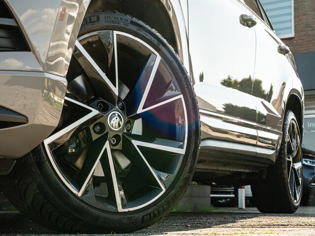 Skoda Karoq 1.5 TSI ACT Sportline Business ORG NL 19 INCH CAMERA CANTON AUDIO STOELVERW SPORTSTOELEN