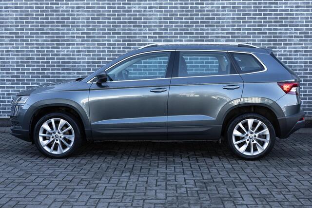 Skoda Karoq 1.5 TSI DSG Style Business | Trekhaak | Panoramadak | Achteruitrijcamera | Parkeersensoren | Keyless Entry | Elektrische Achterklep | Canton Audio | LED Koplampen | Stoelverwarming | Navigatie | Apple Carplay | Android Auto