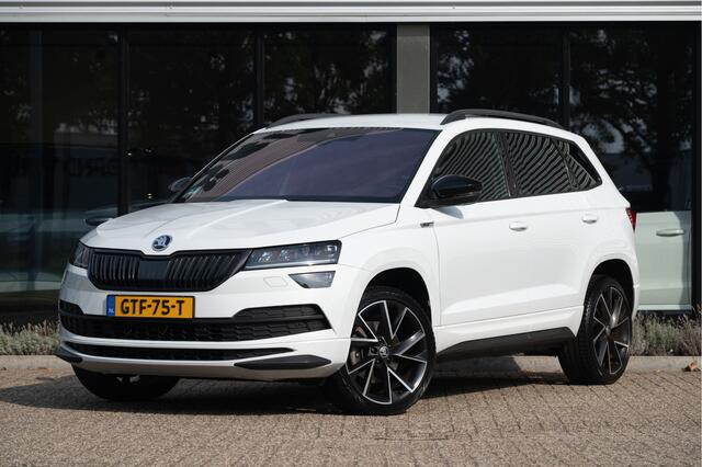 Skoda Karoq 1.5 TSI ACT Sportline | El. Trekhaak | ACC | 19" | Camera | Stoel-stuurverw.