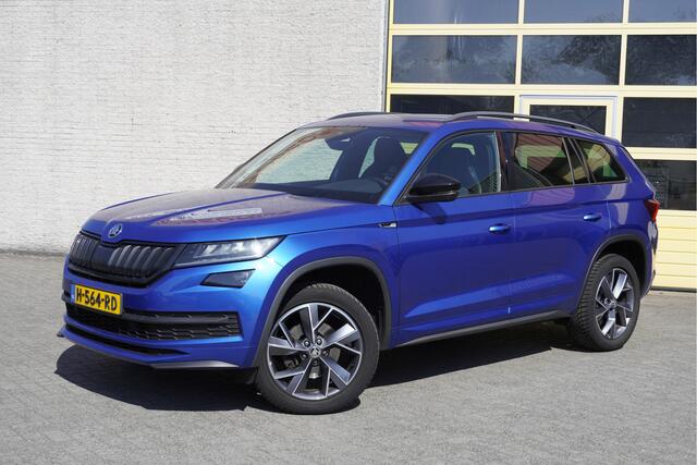 Skoda Kodiaq 1.5 TSI 150PK! Automaat Sportline Business BJ2020 Lmv 19" | Led | Pdc | Navi | Keyless entry | Elek. trekhaak | Elek. achterklep | Achteruitrijcamera | App-Connect | Canton Audio | Virtual cockpit | Elek. Be stoel+Mem | Verwarmde voorstoelen