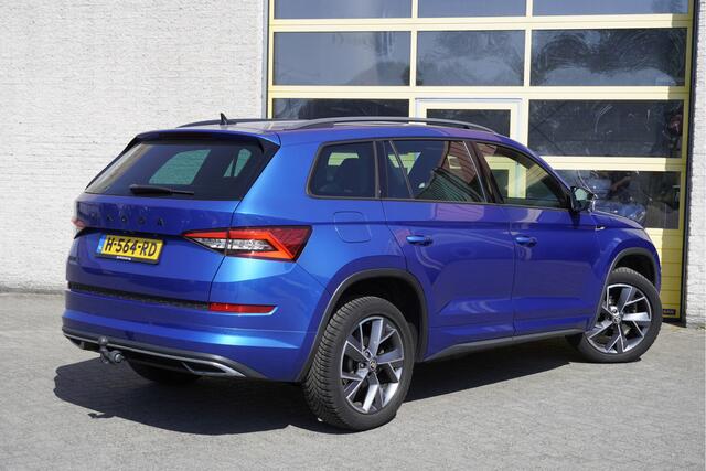 Skoda Kodiaq 1.5 TSI 150PK! Automaat Sportline Business BJ2020 Lmv 19" | Led | Pdc | Navi | Keyless entry | Elek. trekhaak | Elek. achterklep | Achteruitrijcamera | App-Connect | Canton Audio | Virtual cockpit | Elek. Be stoel+Mem | Verwarmde voorstoelen