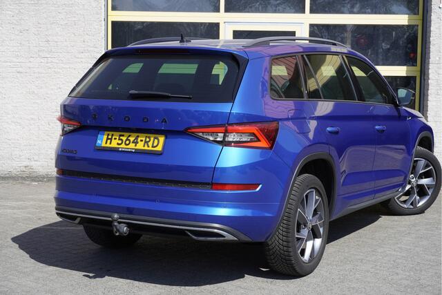 Skoda Kodiaq 1.5 TSI 150PK! Automaat Sportline Business BJ2020 Lmv 19" | Led | Pdc | Navi | Keyless entry | Elek. trekhaak | Elek. achterklep | Achteruitrijcamera | App-Connect | Canton Audio | Virtual cockpit | Elek. Be stoel+Mem | Verwarmde voorstoelen
