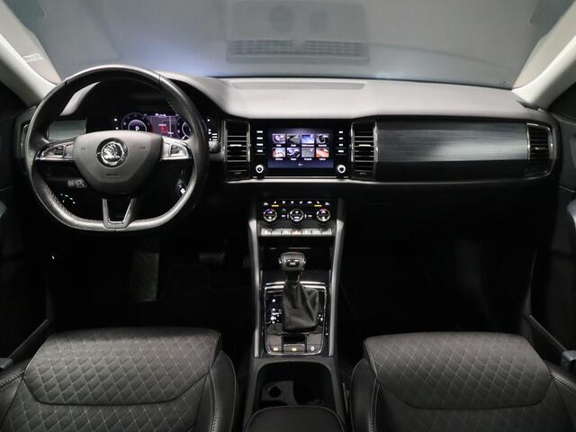 Skoda Kodiaq 1.5 TSI Sport Business [CARPLAY, SCHUIFKANTELDAK, CAMERA, PDC, ADAPTIVE CRUISE CONTROL, CANTON AUDIO, TREKHAAK, DIGITAL DASH, STOELVERWARMING, FLIPPERS,ELEKTRISCHE ACHTERKLEP, HALF LEDER,