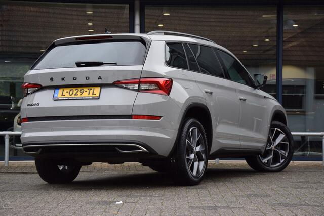Skoda Kodiaq 1.5 TSI Sportline Business DSG Automaat | BOVAG Garantie | Org. NL | Trekhaak | Vitrueel Dashboard | Adaptive Cruise | Camera | Stoelverwarming | Full LED | 19'' Velgen |