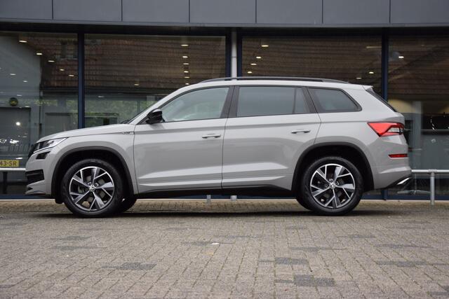Skoda Kodiaq 1.5 TSI Sportline Business DSG Automaat | BOVAG Garantie | Org. NL | Trekhaak | Vitrueel Dashboard | Adaptive Cruise | Camera | Stoelverwarming | Full LED | 19'' Velgen |