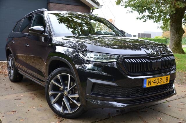 Skoda Kodiaq 1.5 TSI Sportline Business 7 Persoons. Navi/Led/Ecc/Pdc/Achteruitrij-camera/Stuur&Stoelverwarming/Half-Leer/Panoramadak/Privacy-Glass/Cruise control adaptief/Elektrisch verstelbare stoelen/Wegklapbare Trekhaak