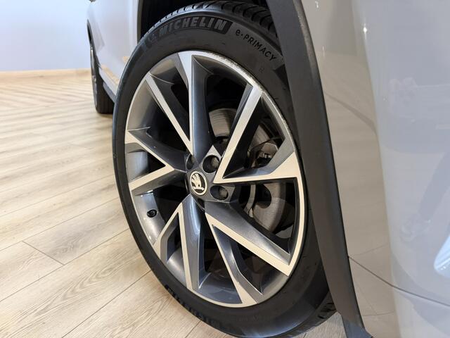 Skoda Kodiaq 1.5 TSI Sportline Business 7p. Airco ECC | Panorama | Trekhaak | Virtual | Canton | Memory | Camera | Cruise Control | Isofix | NAP