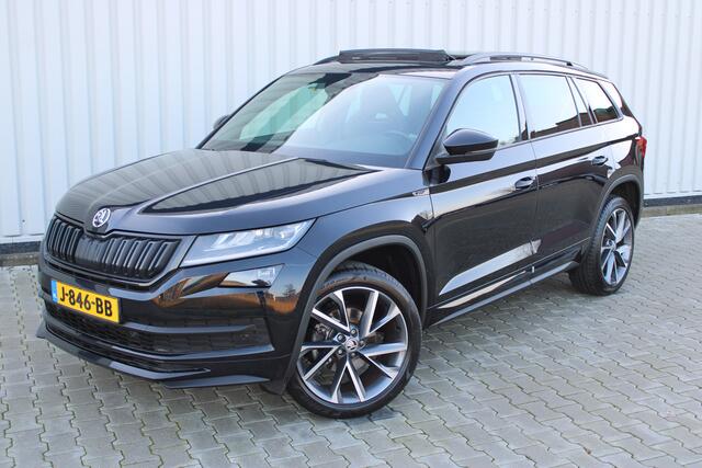 Skoda Kodiaq 1.5 TSI Sportline Business | Incl. 12 maanden garantie | Wegklapbare trekhaak | Apple CarPlay | Canton audio | Adaptive cruise | Stoelverwarming | Achteruitrij camera | Parkeersensoren |