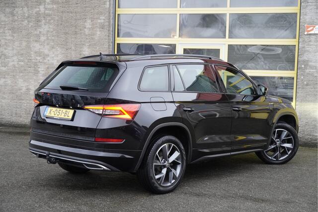 Skoda Kodiaq 1.5 TSI 150PK! Automaat Sportline Business BJ2020 Lmv 19" | Led | Pdc | Navi | Keyless entry | Elek. trekhaak | Elek. achterklep | Verwarmd voorruit | Achteruitrijcamera | App-Connect | Virtual cockpit | Canton Audio | Sportstoelen | Verwarmde voorstoelen