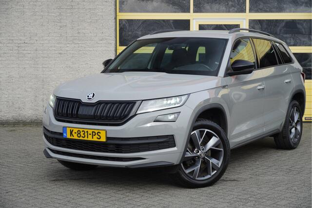Skoda Kodiaq 1.5 TSI 150PK! Automaat Sportline Business BJ2021 Lmv 19" | Led V+A | Pdc | Keyless entry | Elek. trekhaak | Achteruitrijcamera | App-Connect | Navi | Virtual cockpit | Dashboard verlichting | Elek. Be stoel+Mem | Verwarmde voorstoelen | Zwarte hemel