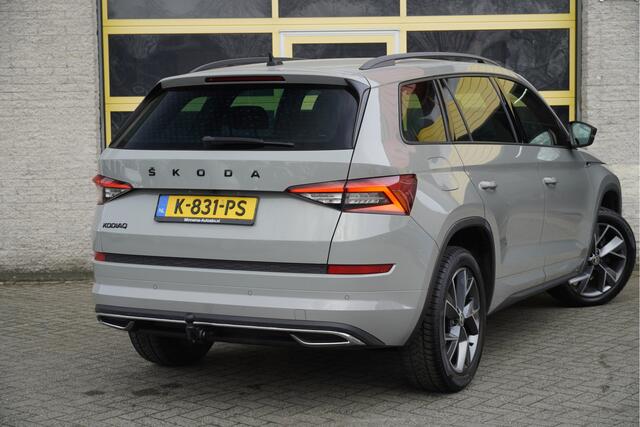 Skoda Kodiaq 1.5 TSI 150PK! Automaat Sportline Business BJ2021 Lmv 19" | Led V+A | Pdc | Keyless entry | Elek. trekhaak | Achteruitrijcamera | App-Connect | Navi | Virtual cockpit | Dashboard verlichting | Elek. Be stoel+Mem | Verwarmde voorstoelen | Zwarte hemel