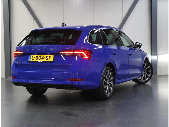 Skoda OCTAVIA Combi 1.0 110PK TSI Business Edition Plus | 2de eigenaar | AppleCarplay/AndroidAuto | Stoelverwarming | Navigatie | 17"LMV | Climate Control | Cruise Control | Sfeerverlichting | Keyless | Isofix | Privacy Glass | Parkeersensoren | Electrische achterklep