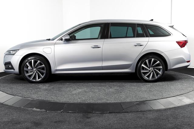 Skoda OCTAVIA Combi 1.4 TSI iV PHEV Business Edition Plus | Org. NL | Afn. Trekhaak | Apple CarPlay | ACC | Navi | Stoel- & Stuurverwarming | PDC V+A | Camera | 18" |