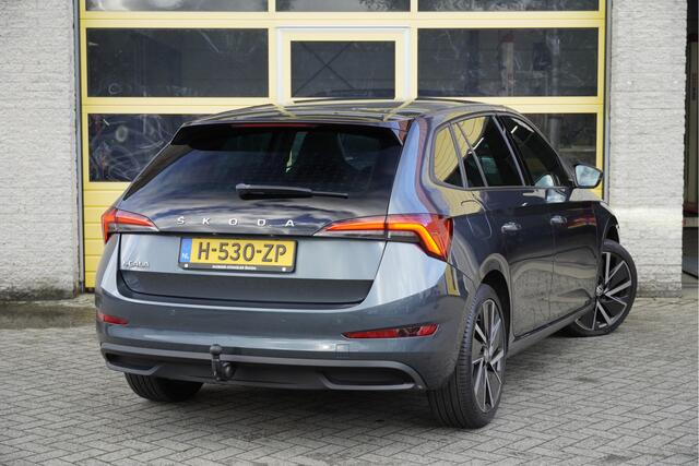 Skoda SCALA 1.5 TSI 150PK! Automaat 5drs Sport Business BJ2020 Lmv 18" | Led V+A | Pdc | Panoramadak | Elek. trekhaak | App-Connect | Climate control | Cruise control | RS-Sportstoelen | RS-Sport stuurwiel | Verwarmde voorstoelen | Zwarte hemel | Extra getint glas