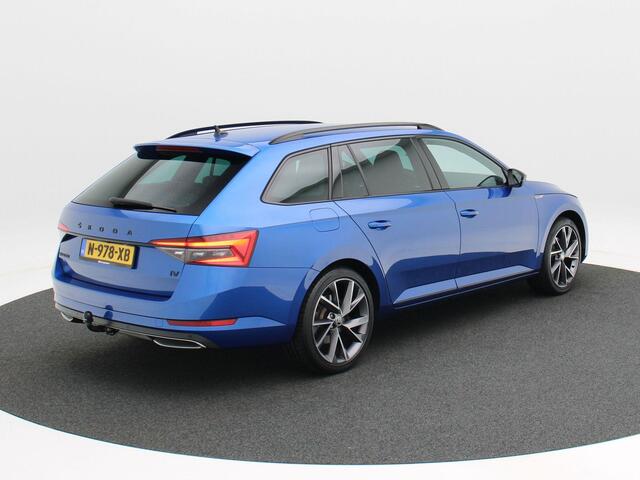 Skoda SUPERB Combi 1.4 TSI iV 218 Pk Automaat Sportline Business | Trekhaak | Full LED | Canton Audio | Carplay | Camera | Parkeersensoren | Navigatiesysteem | Stoel Verwarming | Elektrische Achterklep | 19 Inch | 43.469 Km
